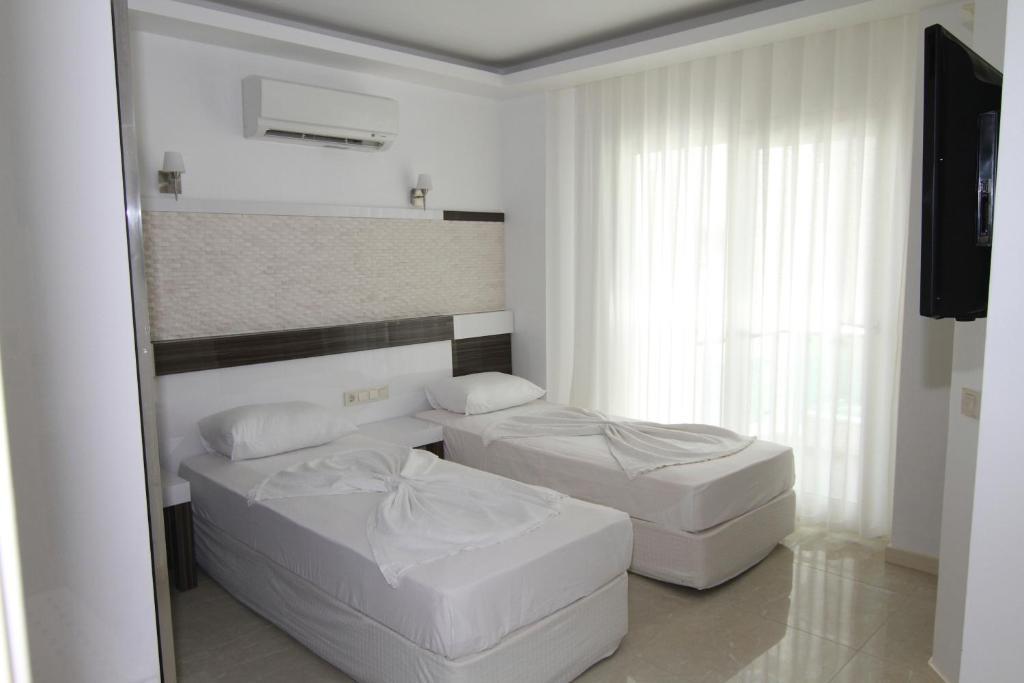 Kas Maki Hotel Quarto foto